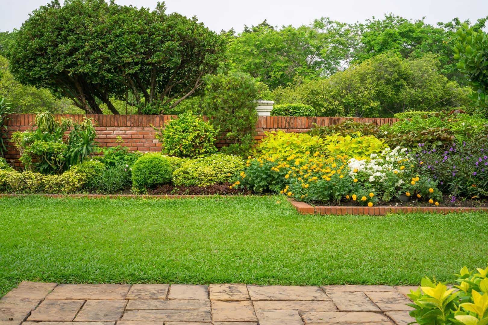 expert lawn mowing, mulching applications, and landscaping services in Augusta, Kansas